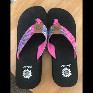 Yellow box flip flops